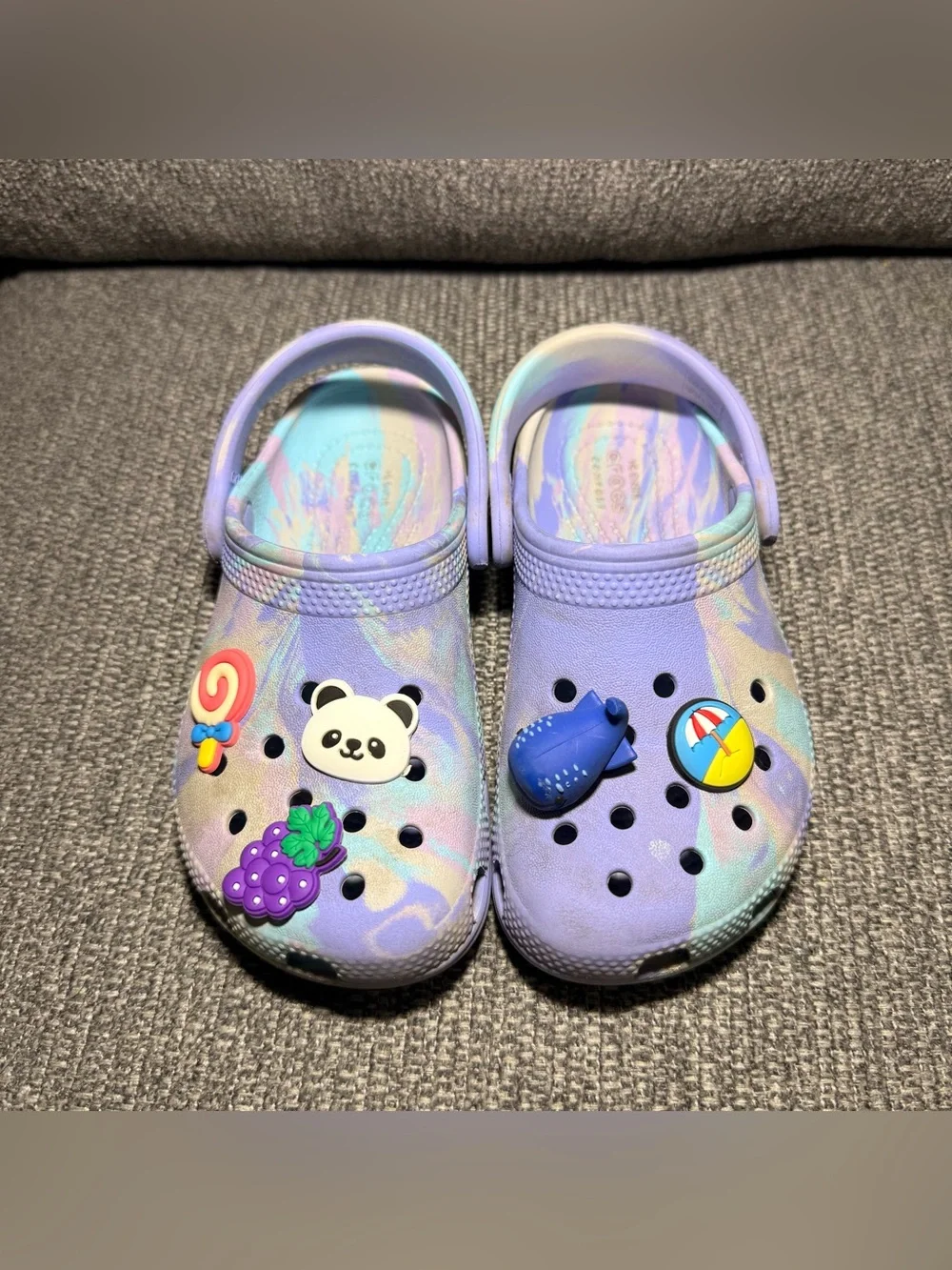 Crocs Kids' Classic Marbled Clogs in a purple/pink and blue  size C11